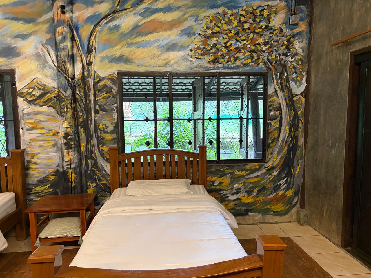 Sarapi bed with mural detail